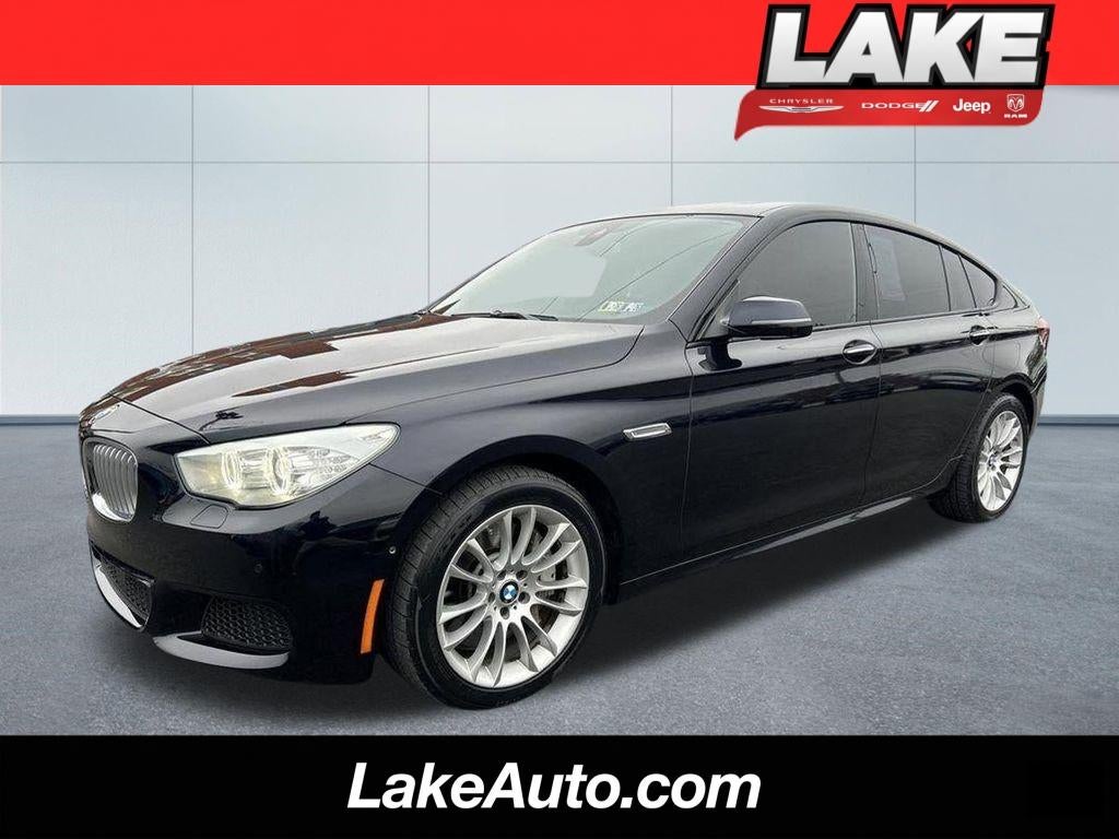 2017 BMW 5 series 550i xDrive in Carbon Black Metallic — front three-quarter view
