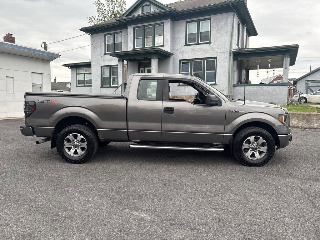 2013 Ford F-150 — rear three-quarter view